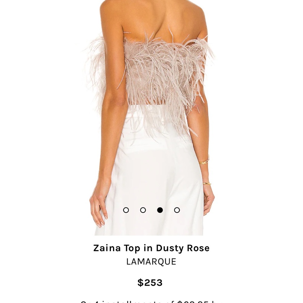 New with tags, feather top, zips in back, strapless